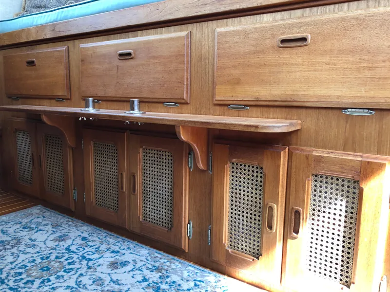 Storage under helm seat