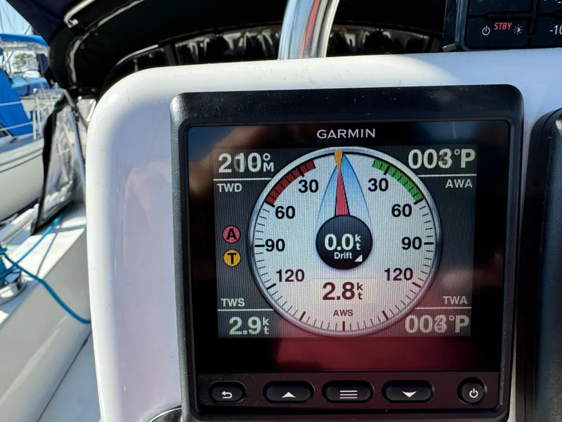 Garmin navigation display on a 1989 Catalina Sloop sailboat, showing wind and drift data.