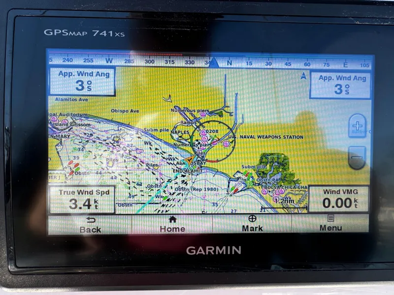 Garmin GPS display on 1989 Catalina Sloop showing nautical map and wind data.