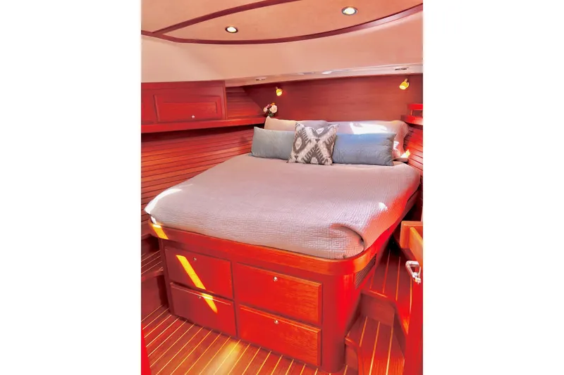Luxurious cabin interior of 2016 Sabre 38 Salon Express yacht with cozy bed.