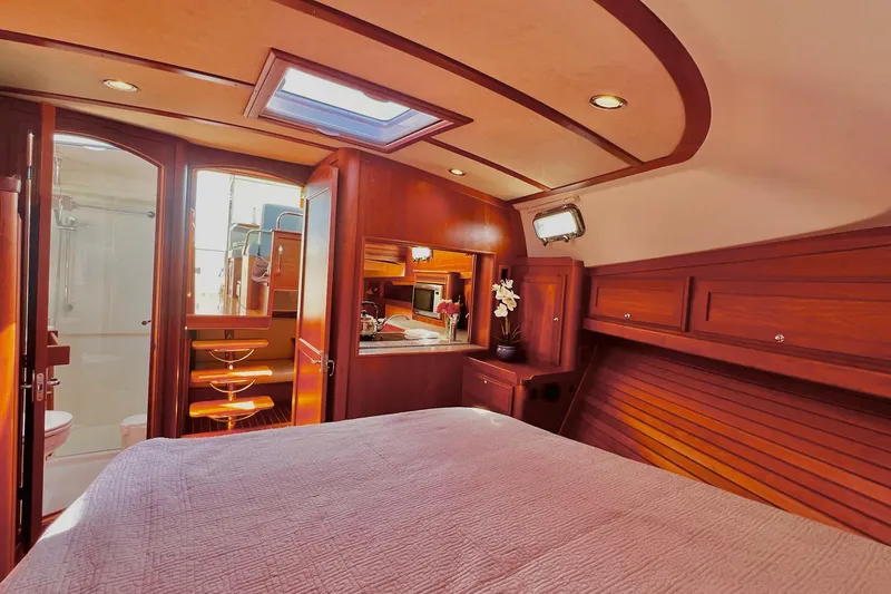 Luxurious interior of 2016 Sabre 38 Salon Express yacht with wood finish and skylight.
