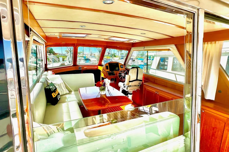 Interior of 2016 Sabre 38 Salon Express yacht with elegant seating and helm.