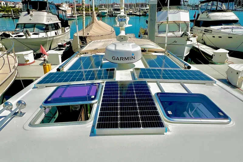 2016 Sabre 38 Salon Express with solar panels and Garmin equipment at marina.