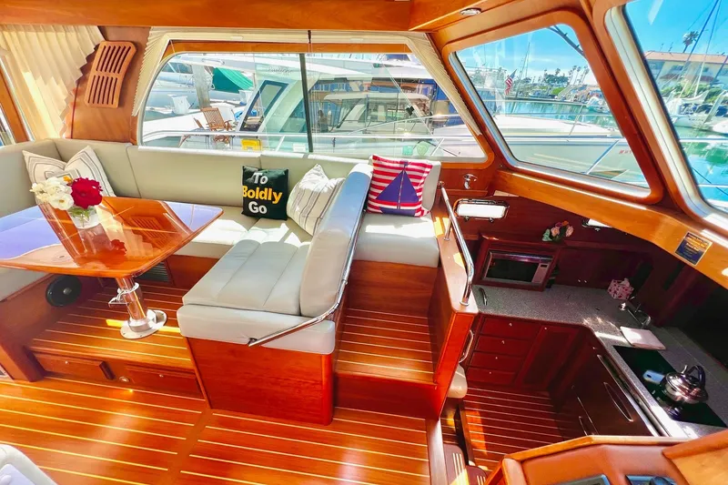 Luxurious interior of 2016 Sabre 38 Salon Express yacht with elegant wood finish.