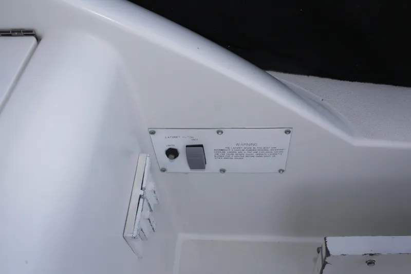 Control panel on a 1996 Trojan 440 Express boat interior.
