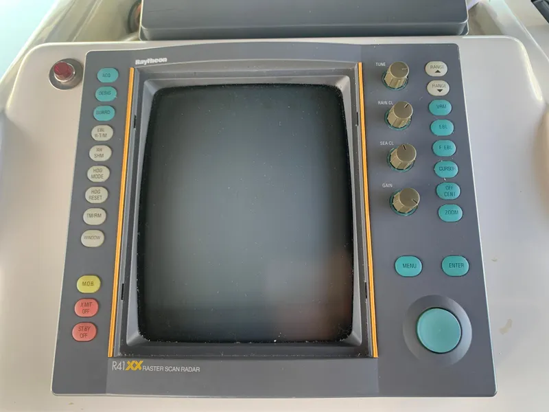 Raytheon radar display on 1996 Trojan 440 Express boat dashboard.