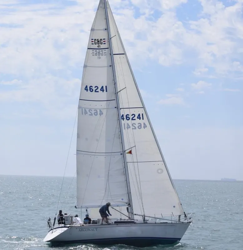 1985 C&C 41 sailboat cruising on open sea.