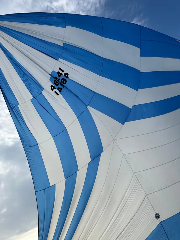 Blue and white striped sail of a 1985 C&C 41.