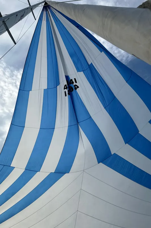 Blue and white striped sail of a 1985 C&C 41.