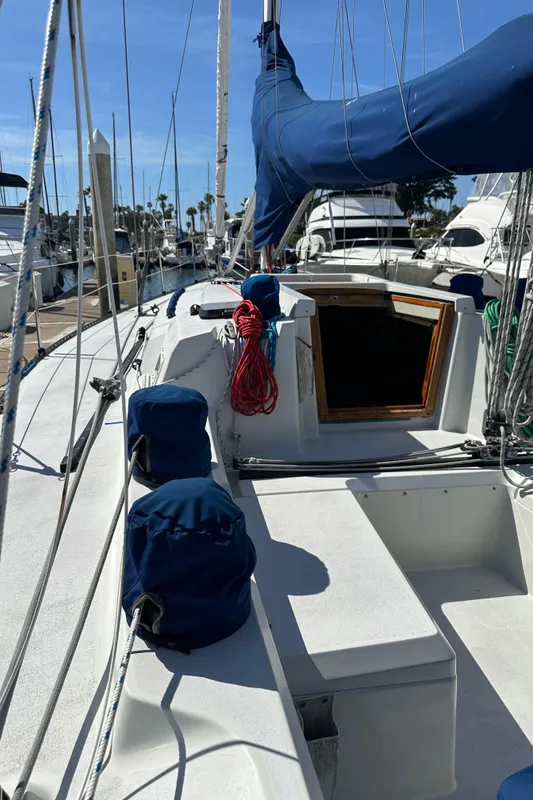 1985 C&C 41 sailboat docked at marina.