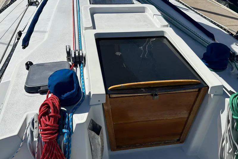 C&C 41 sailboat cockpit with ropes and wooden hatch, year 1985.
