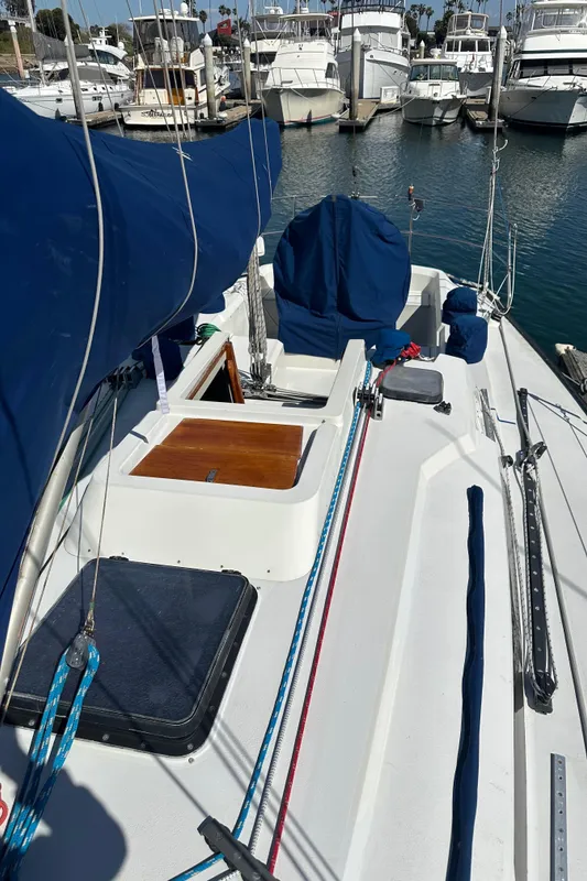 1985 C&C 41 sailboat docked in marina.