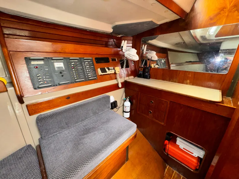 Interior of a 1985 C&C 41 yacht with wooden furnishings.