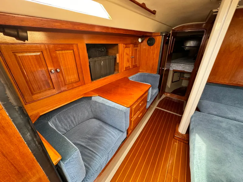 Interior of a 1985 C&C 41 yacht with wooden furnishings.
