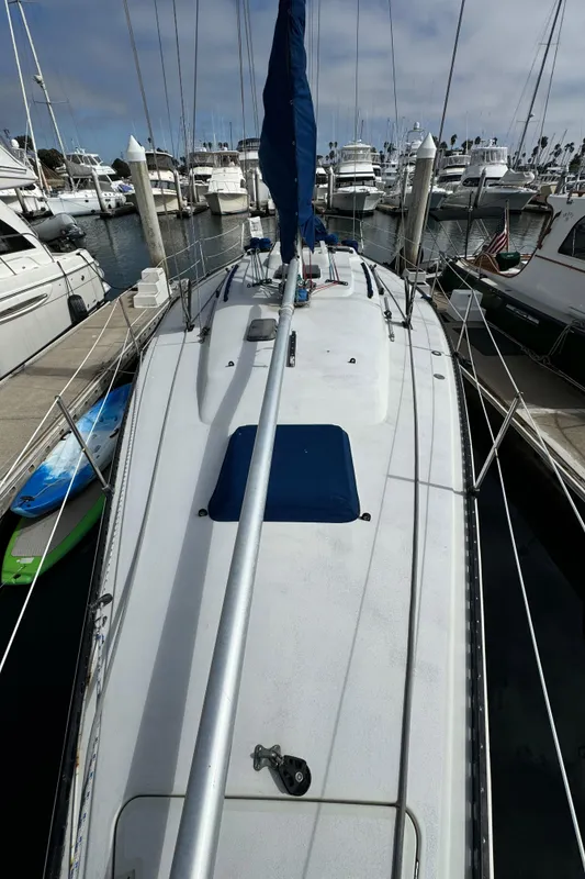 1985 C&C 41 sailboat docked in marina.