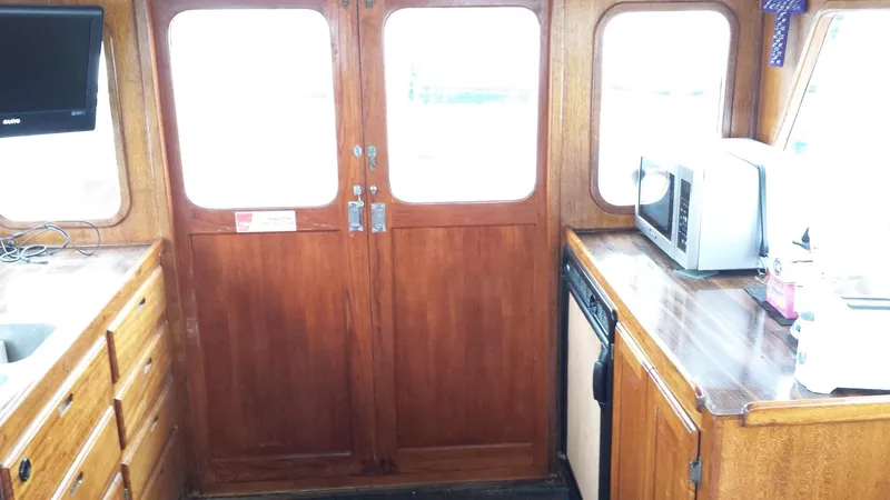 galley and double teak doors