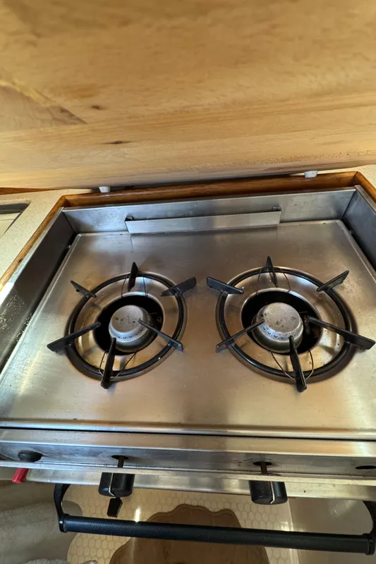 Two-burner stainless steel stove in a 1998 Catalina 36 MkII yacht kitchen.