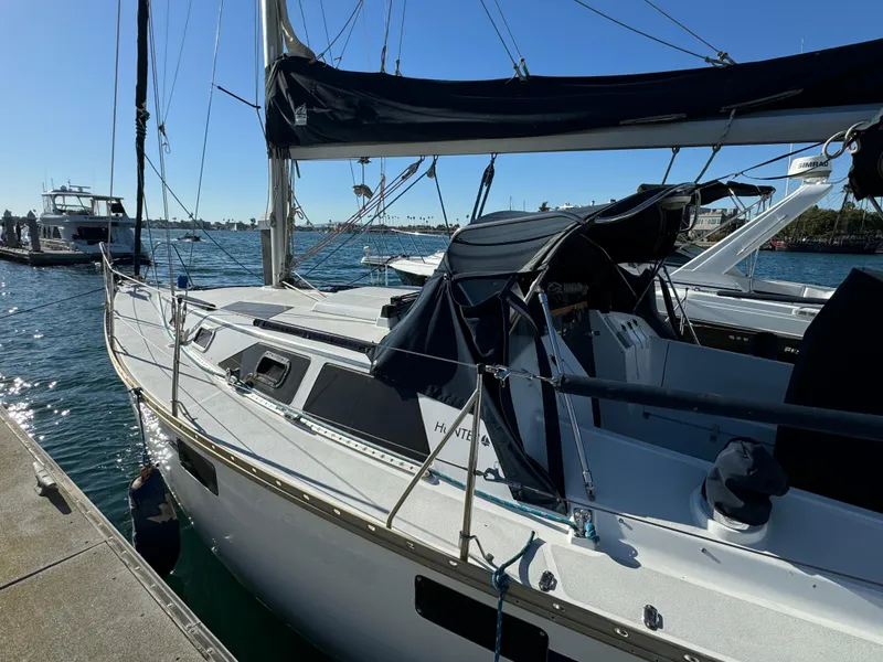 1992 Hunter 35 sailboat docked at marina on a sunny day.