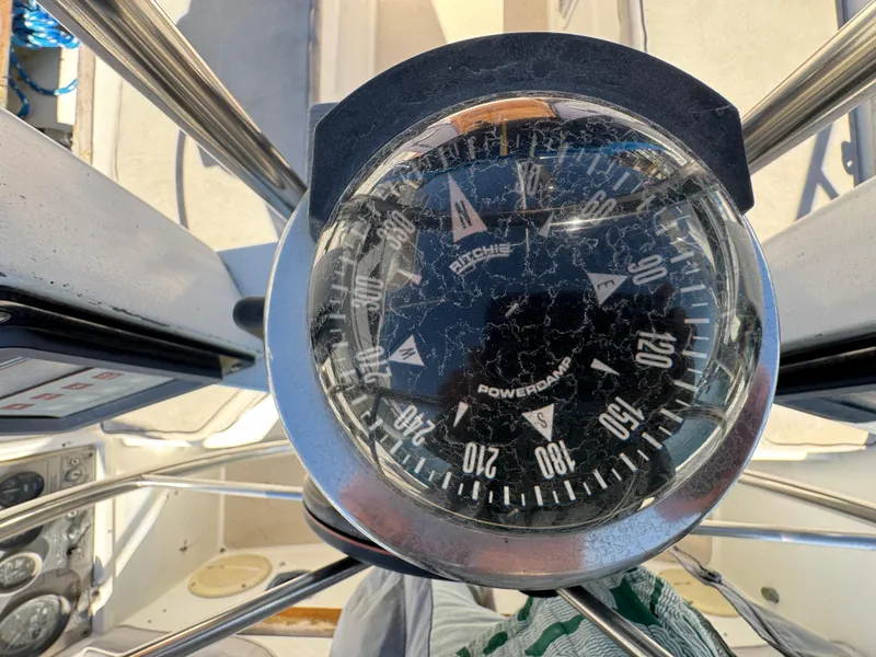 Compass on 1987 Catalina 34 sailboat, showing navigation details.