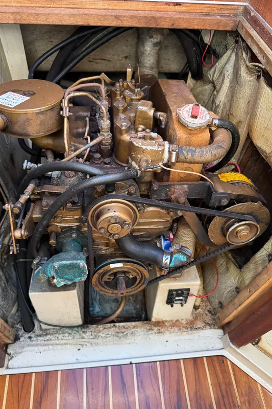 1987 Catalina 34 engine compartment with visible components and wiring.