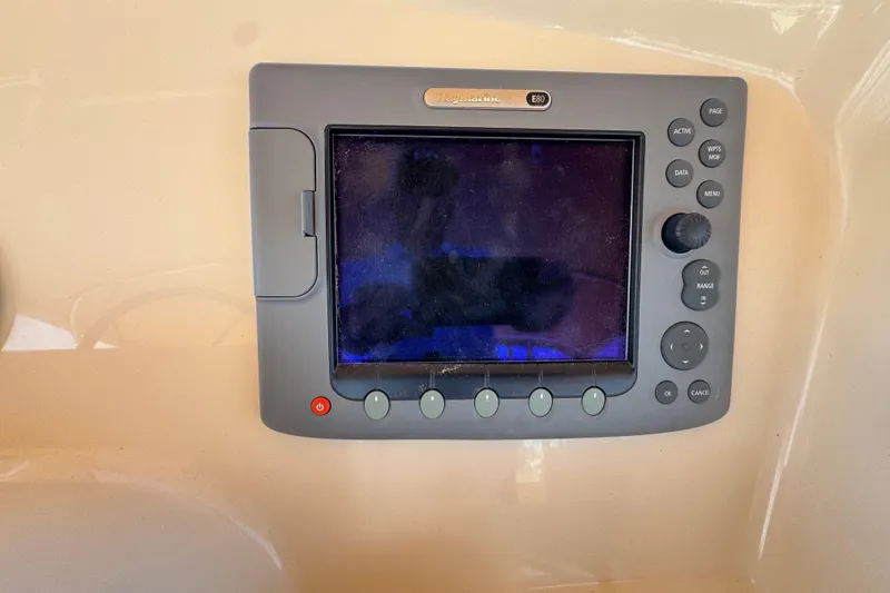 Raymarine E80 display on 2006 Mainship 34 Trawler dashboard.