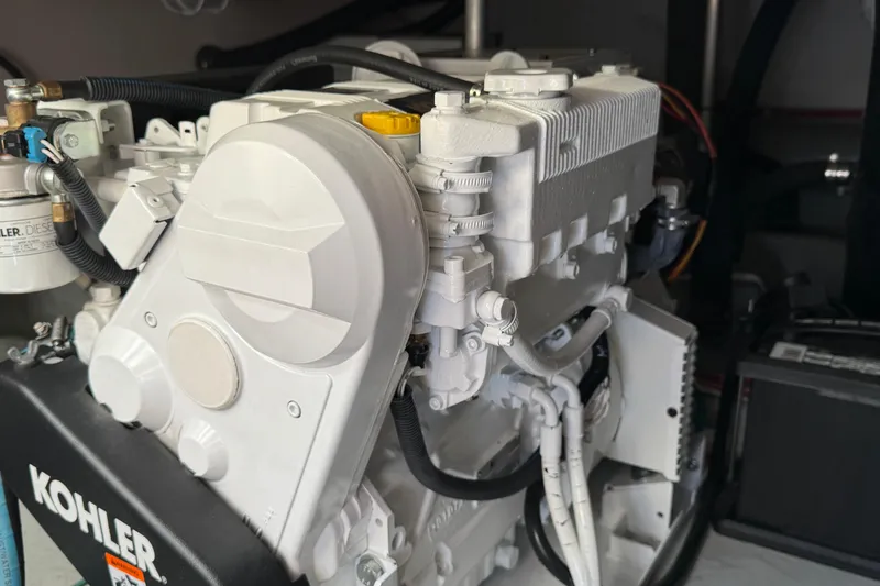 Engine of 2006 Mainship 34 Trawler, featuring Kohler diesel components.