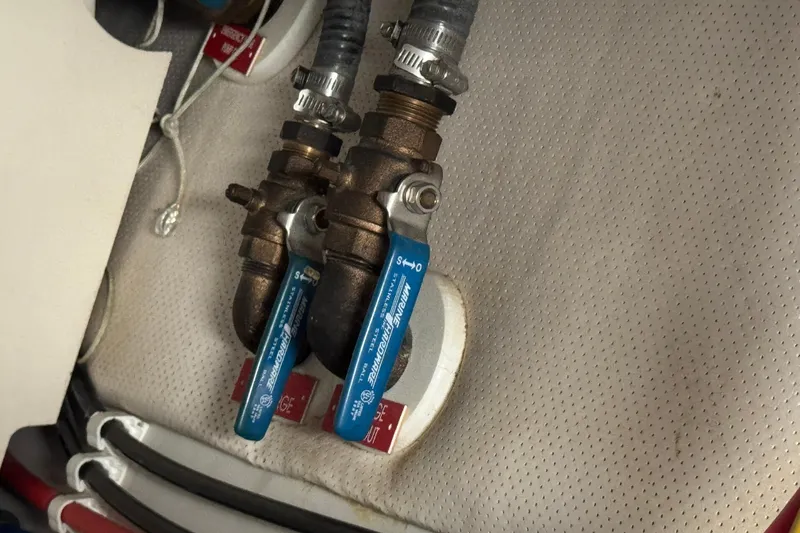 Close-up of valves on a 2006 Mainship 34 Trawler boat.
