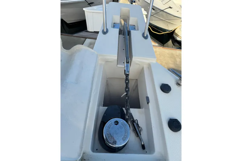 2006 Mainship 34 Trawler anchor chain and winch system on deck.