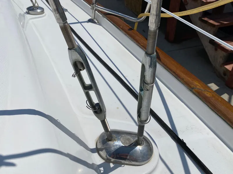 Close-up of rigging hardware on a 2003 Beneteau 423 sailboat.