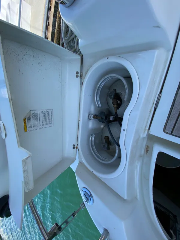 Open storage compartment on a 2003 Beneteau 423 sailboat.