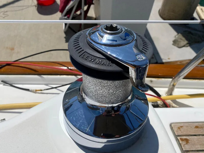 Lewmar winch on a 2003 Beneteau 423 sailboat deck.