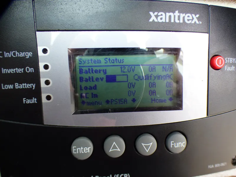 Xantrex system display on 1989 Tiara Yachts 3300, showing battery and load status.