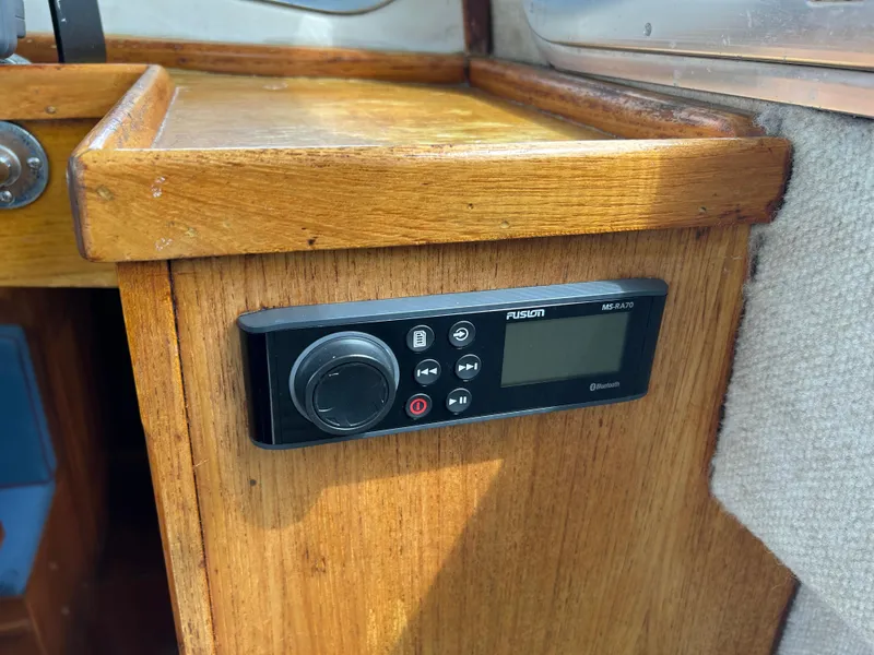 Control panel on 1975 Fisher 30 Motorsailer, mounted on wooden interior surface.