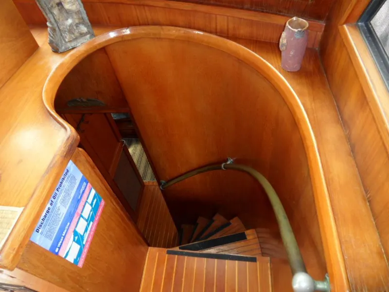 Pilothouse stairway to cabins