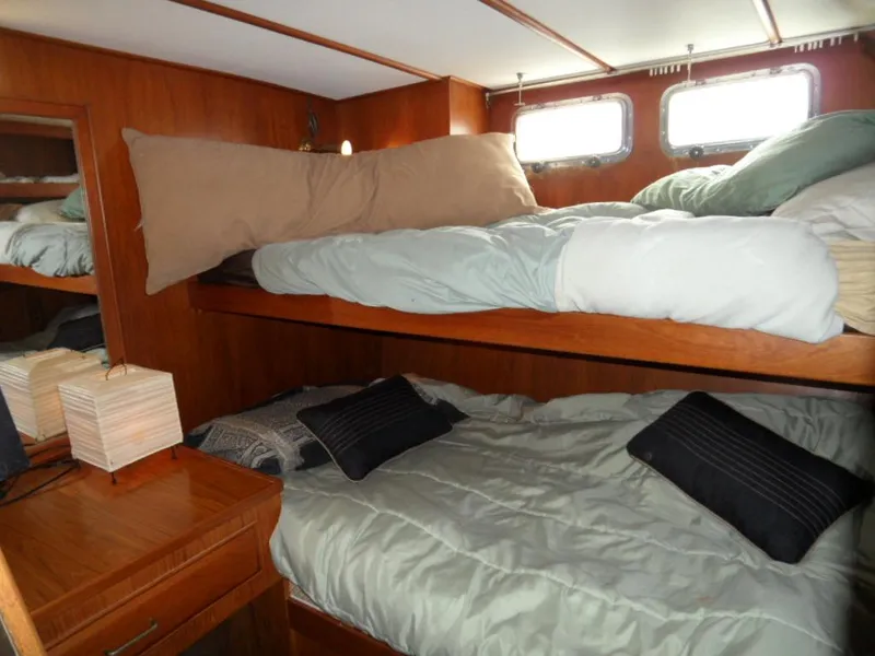 Guest Cabin w double wide bunk low and upper single bunk