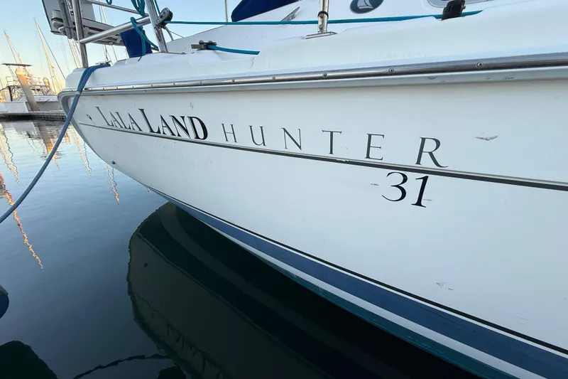 2007 Hunter 31 sailboat named "La La Land" docked at marina.