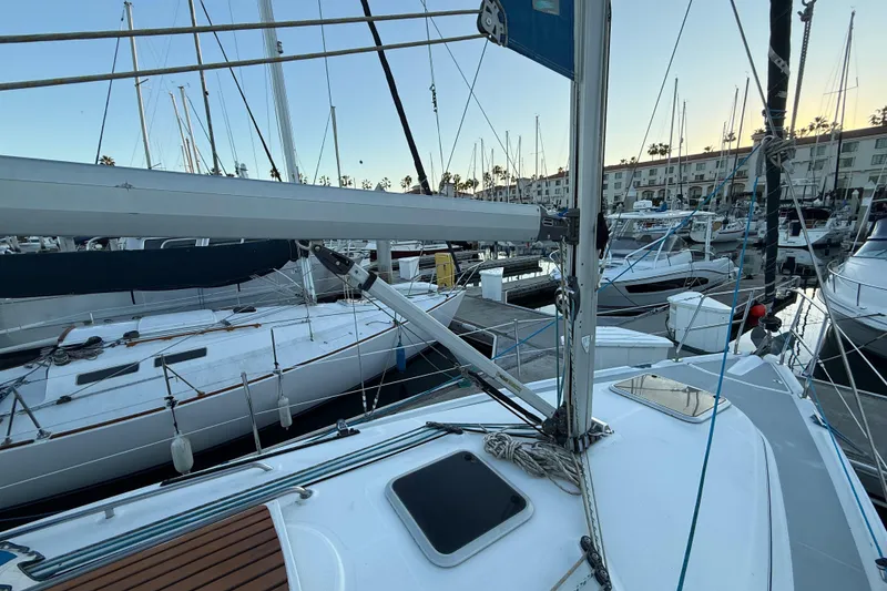 Sailboats docked at marina, featuring a 2007 Hunter 31 model.