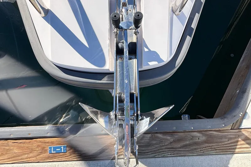 2022 Axopar 28 AFT CABIN boat anchor detail at dock.