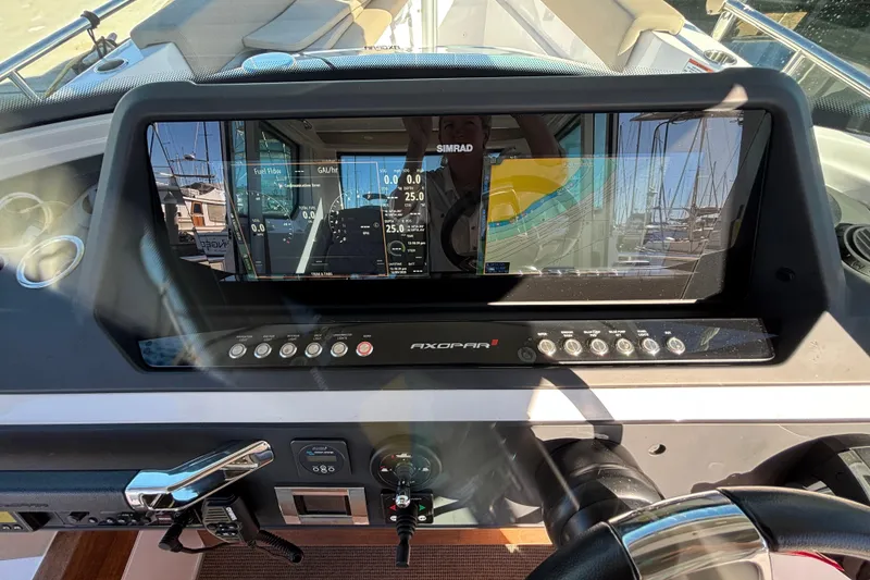 Dashboard of 2022 Axopar 28 AFT CABIN boat with navigation display.