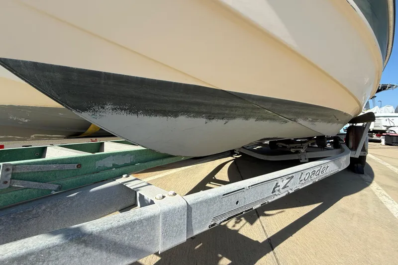 1996 C-Dory 22 boat on EZ Loader trailer, close-up view.