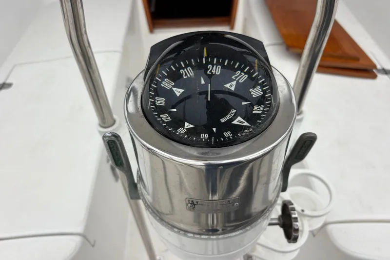 Compass on 1979 Islander Peterson 40 sailboat, showing navigation details.
