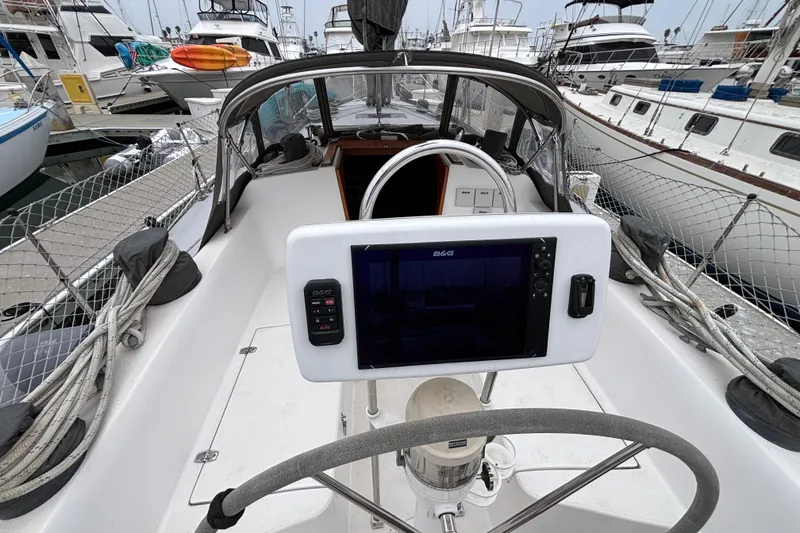 Cockpit view of 1979 Islander Peterson 40 sailboat with navigation equipment.
