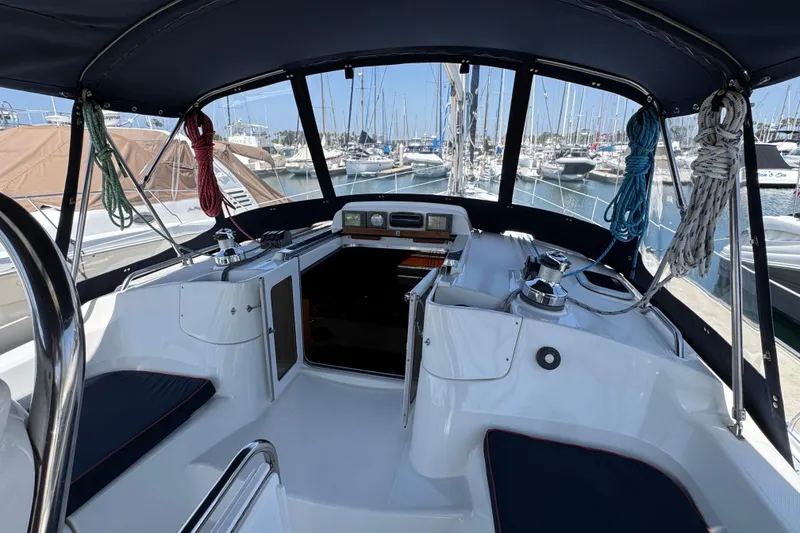 2004 Hunter 41 Aft Cockpit sailboat interior with marina view.
