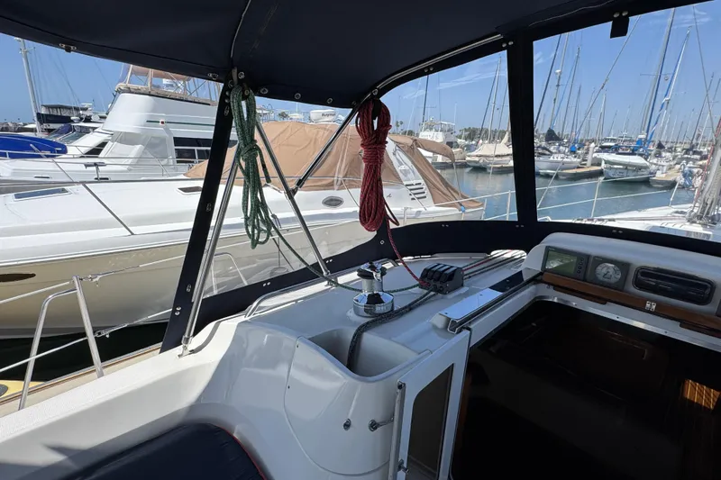 2004 Hunter 41 Aft Cockpit sailboat interior with marina view.