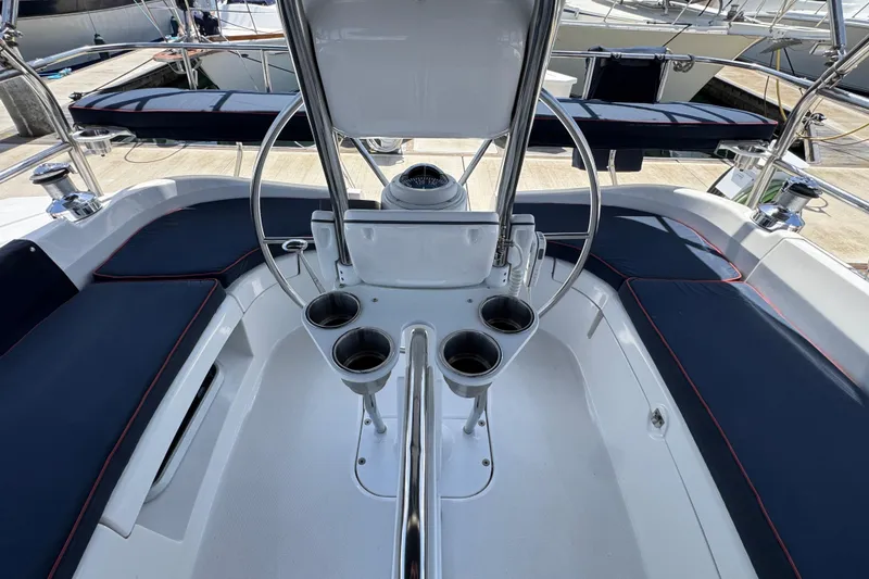 2004 Hunter 41 Aft Cockpit sailboat with spacious seating and steering wheel.