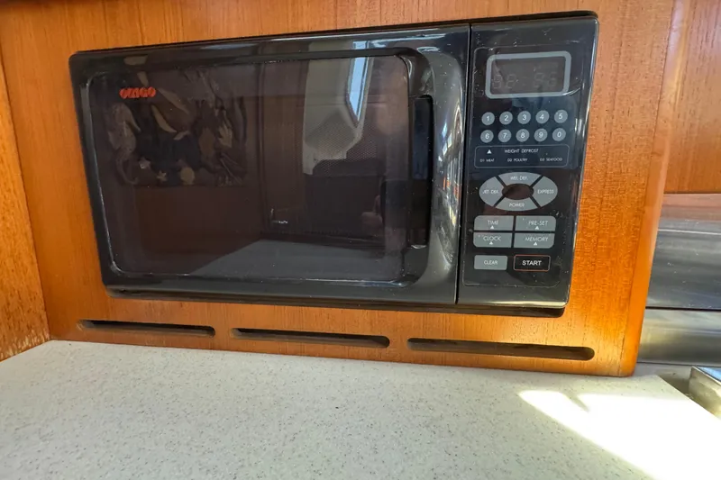 Built-in microwave in 2004 Hunter 41 Aft Cockpit yacht kitchen.