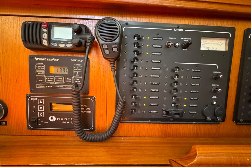 Control panel of a 2004 Hunter 41 Aft Cockpit sailboat with communication and monitoring systems.