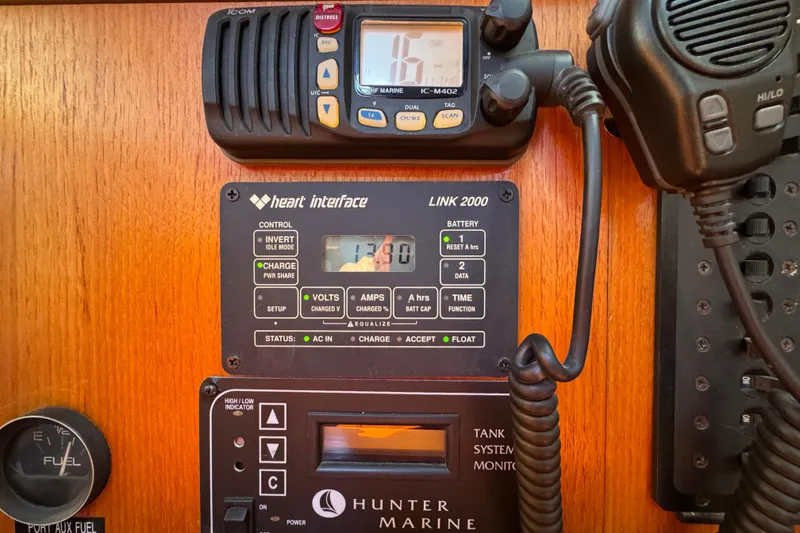 Control panel of a 2004 Hunter 41 Aft Cockpit sailboat with communication equipment.