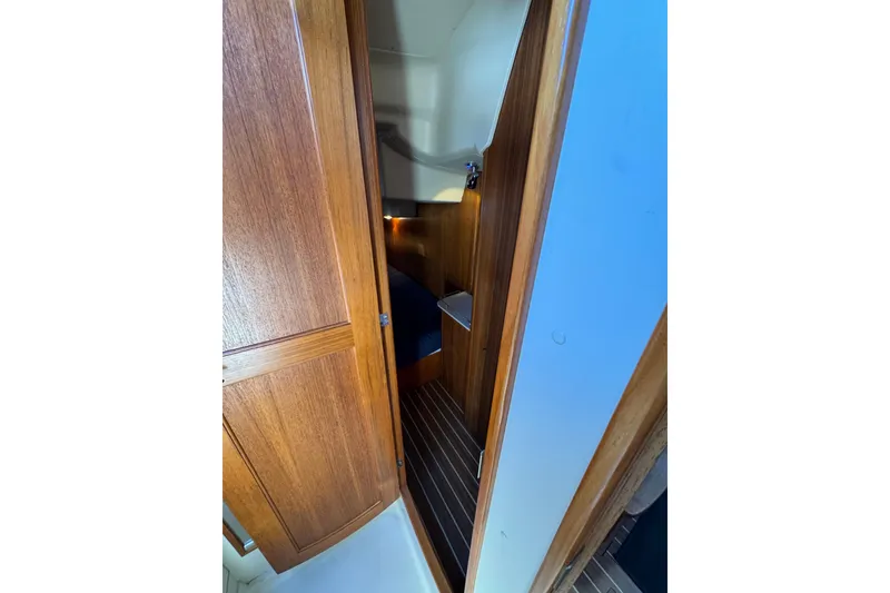 Wooden interior of 2004 Hunter 41 Aft Cockpit sailboat cabin.