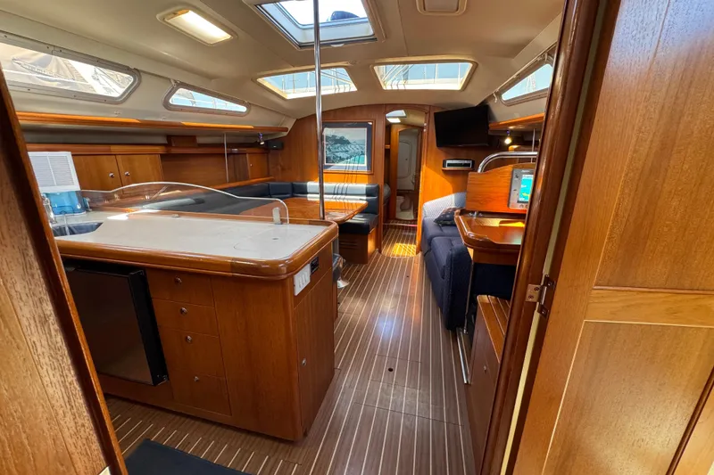 Interior of 2004 Hunter 41 Aft Cockpit yacht with wood finish and modern amenities.